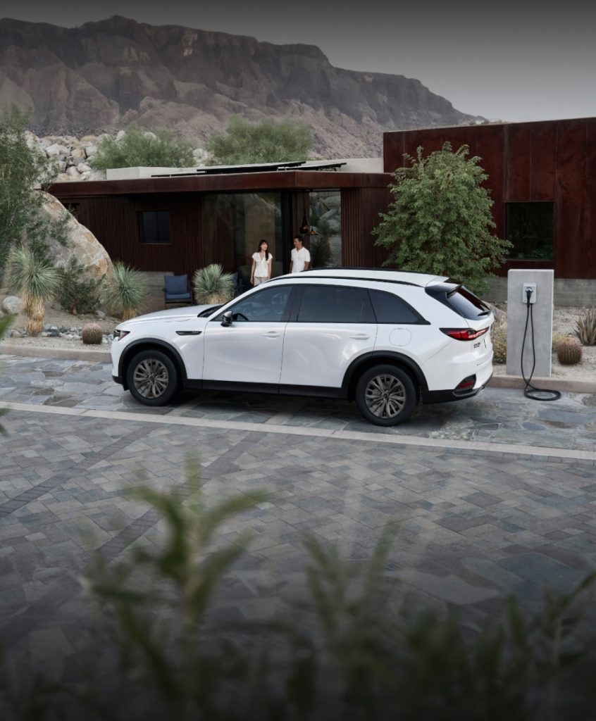Mazda CX-70 PHEV charging at a public charging station